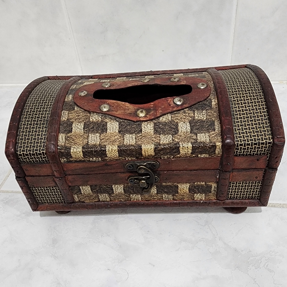 Tissue box made of lightweight wood.